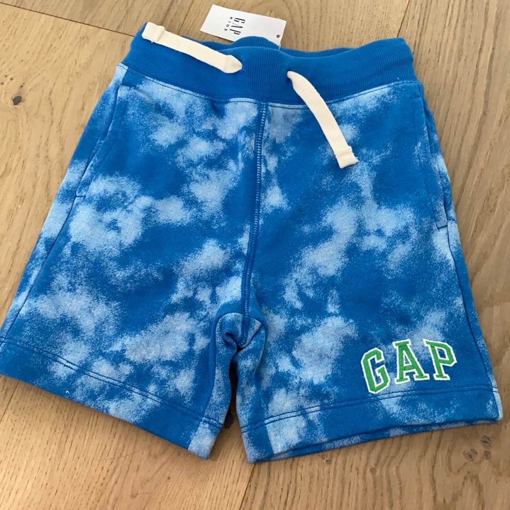 Blue boys short. Never worn with tags.